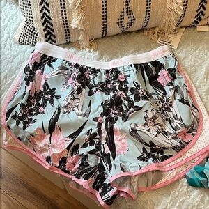 Nike Women's Running Shorts - Pink, Black, and White. Floral